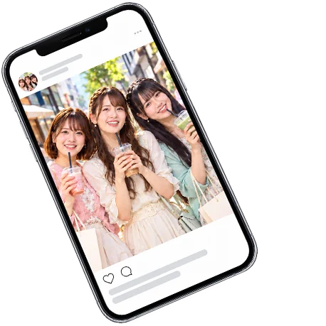 アイドルの投稿が表示されたスマホ